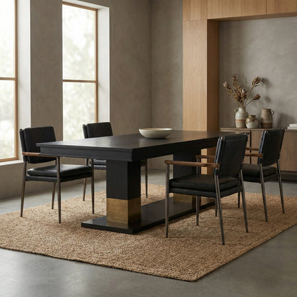 Noir Ravenko Dining Table Hand-Rubbed Black, Brass styled in an interior setting