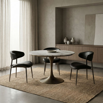 Noir Joni Table 36 inch Aged Brass styled in an interior setting