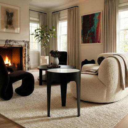 Noir Cylinder Side Table Matte Black 24 inch styled in an interior setting