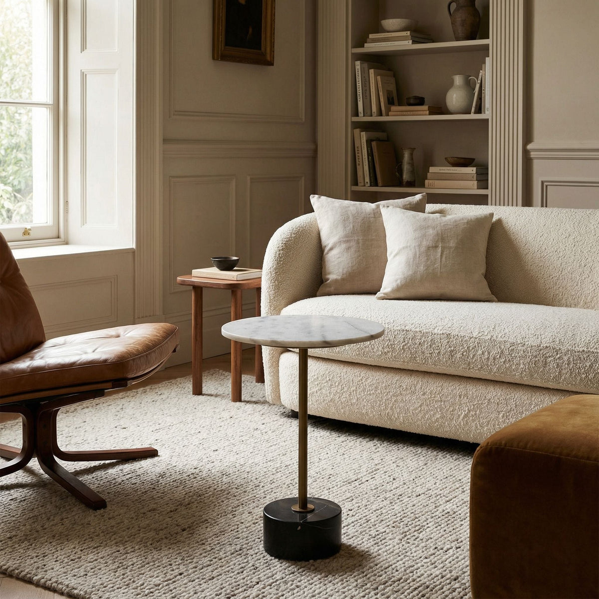 Noir Santosha Side Table Aged Brass styled in an interior setting