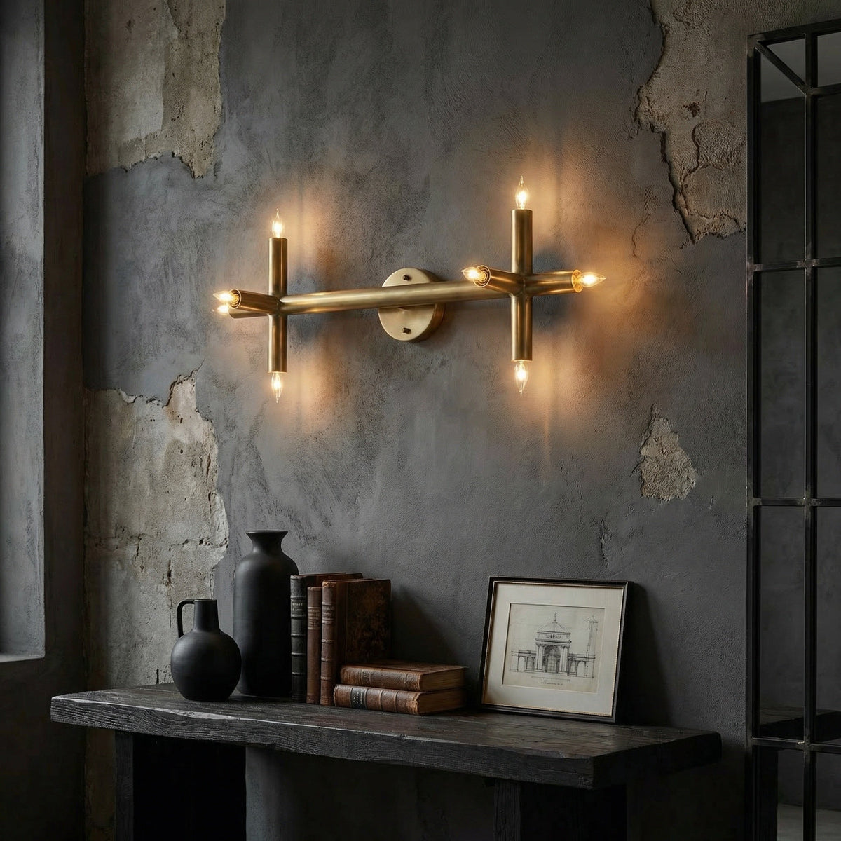 Noir Salome Wall Sconce Antique Brass styled in an interior setting