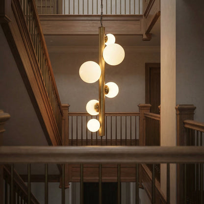 Noir Orellana Chandelier Antique Brass styled in an interior setting