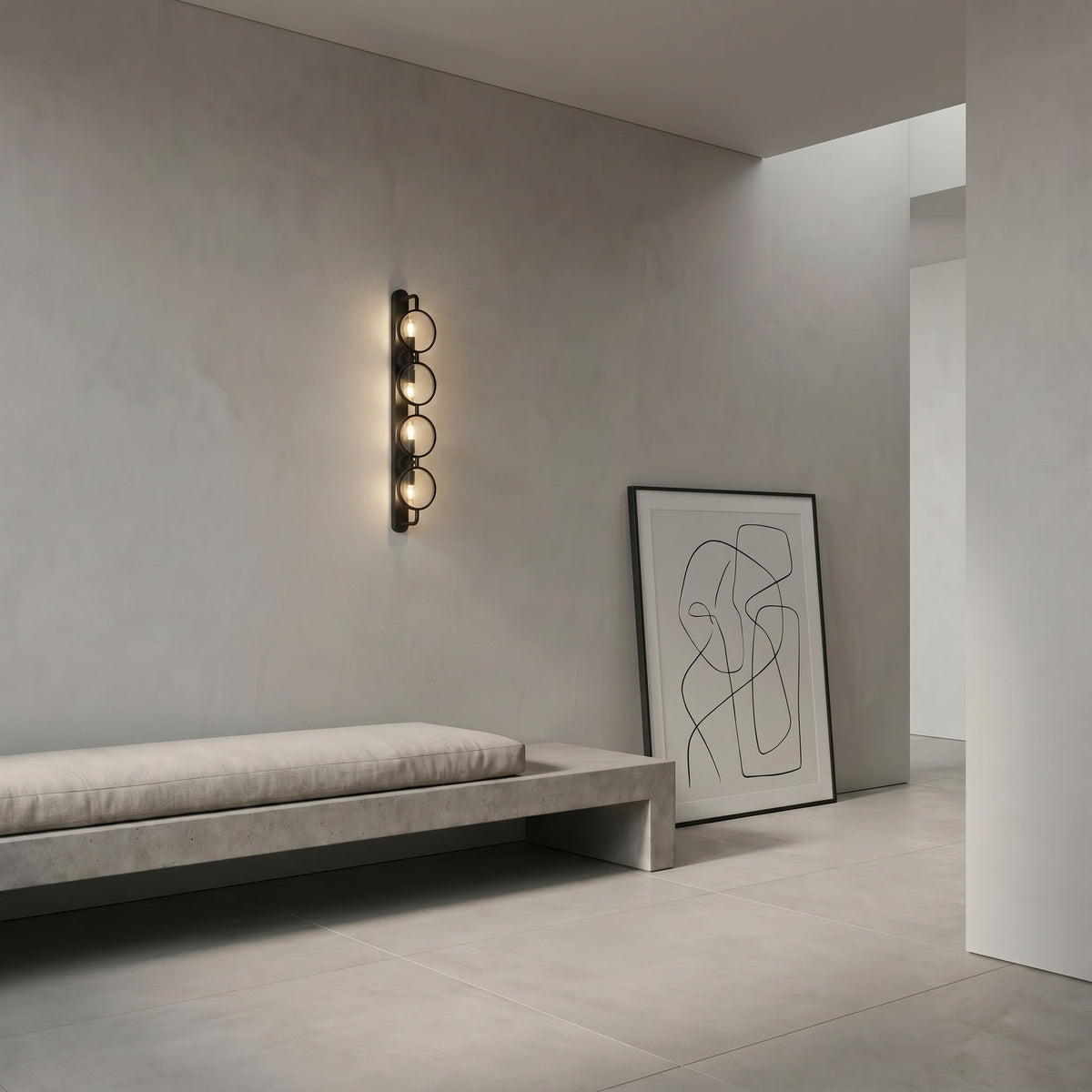 Noir Ordo Wall Sconce Matte Black styled in an interior setting