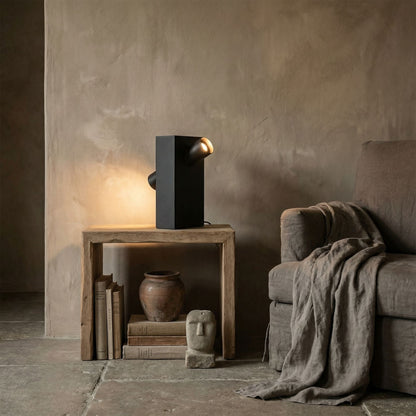 Noir Topo Table Lamp Matte Black styled in an interior setting