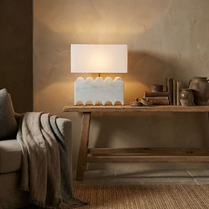 Noir Darth Lamp With Silk Shade White Marble styled in an interior setting