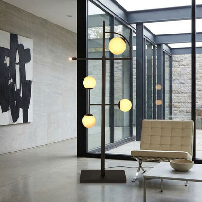 Noir Dasha Floor Lamp Matte Black styled in an interior setting