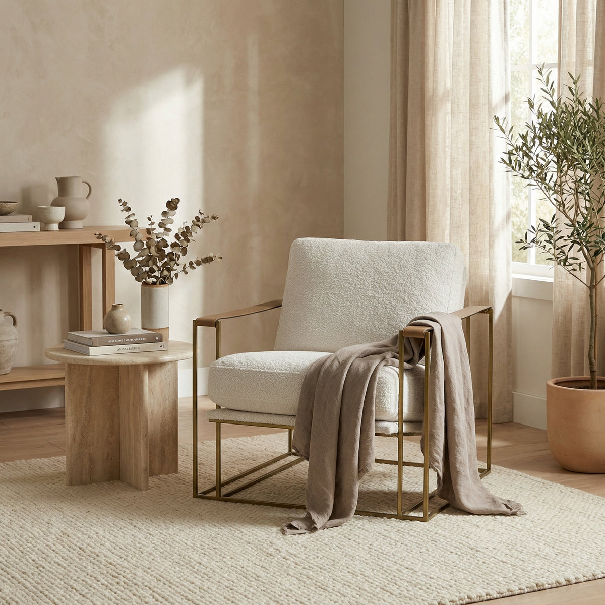 Noir Oryan Club Chair Brass, Off-White styled in an interior setting