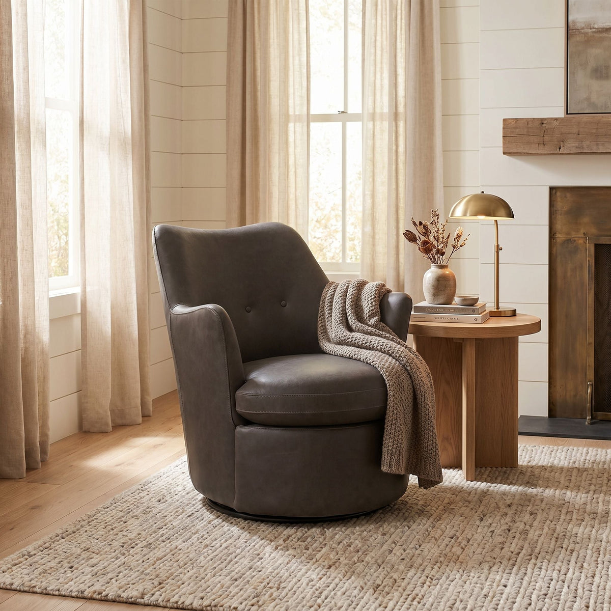 Noir Hotchkiss Swivel Arm Chair Brown Leather styled in an interior setting