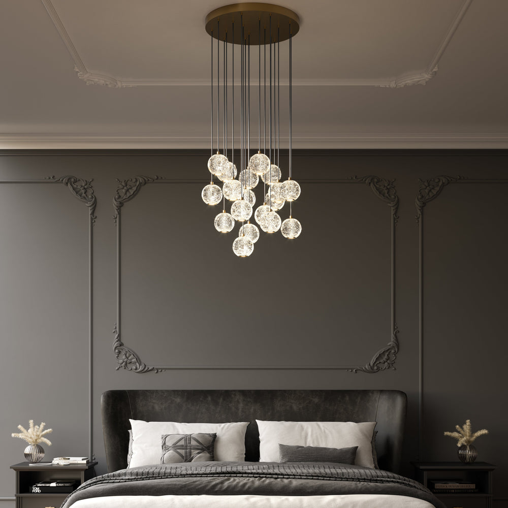Transitional bedroom with dark gray walls, a bed with white bedding, and a decorative chandelier.