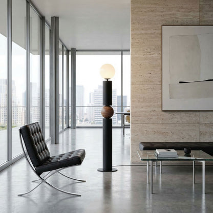 Noir Max Floor Lamp Matte Black styled in an interior setting