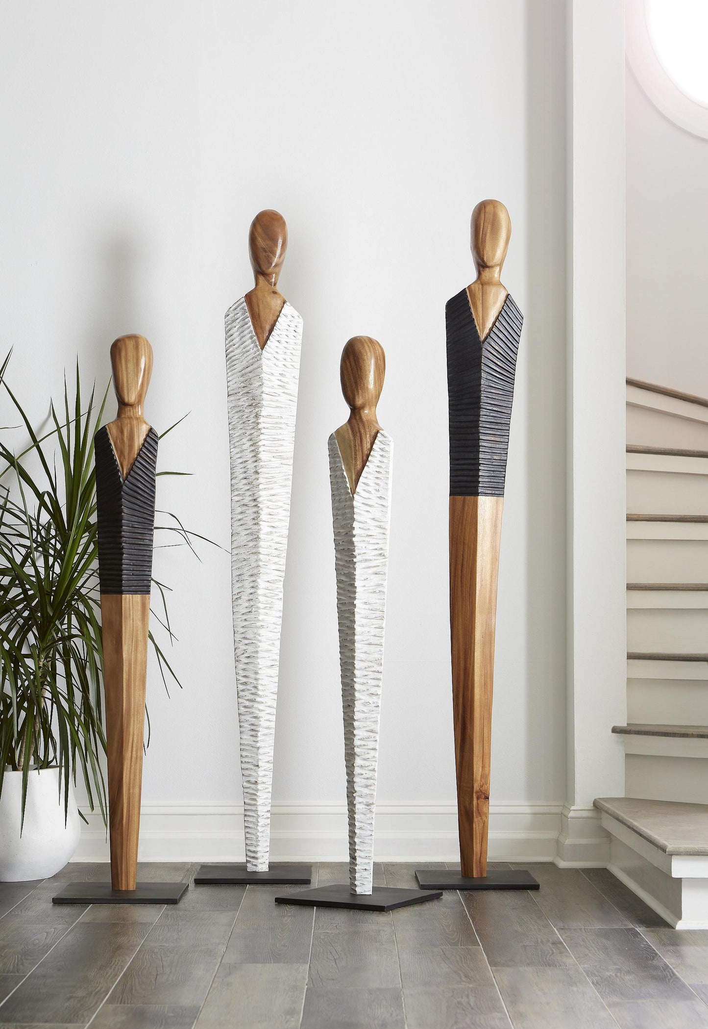 Vested Figure Sculpture