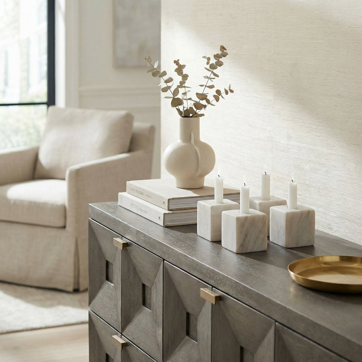 Noir Cube Decorative Candle Holder Natural styled in an interior setting