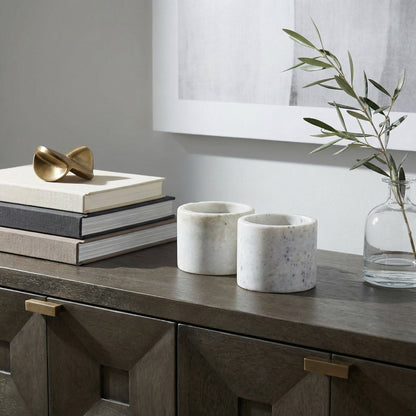 Noir Syma Decorative Candle Holder Waxed White styled in an interior setting