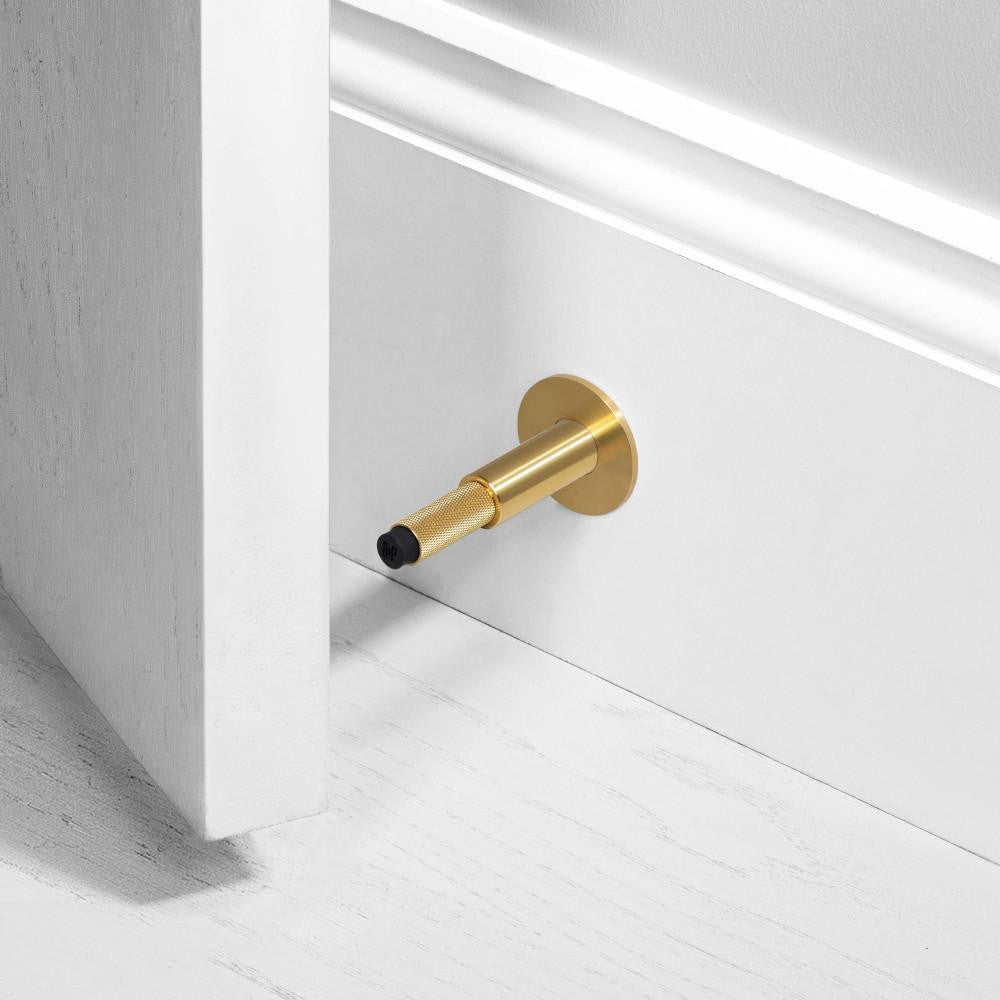 Buster + Punch Wall Mounted Door Stop, Brass
