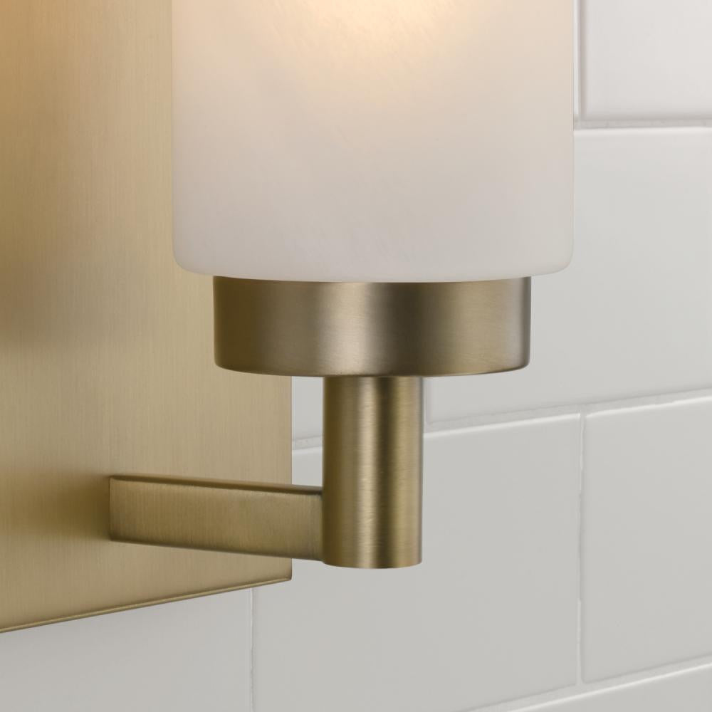 Capital 1-Light Cylindrical Sconce in Aged Brass with Faux Alabaster Glass