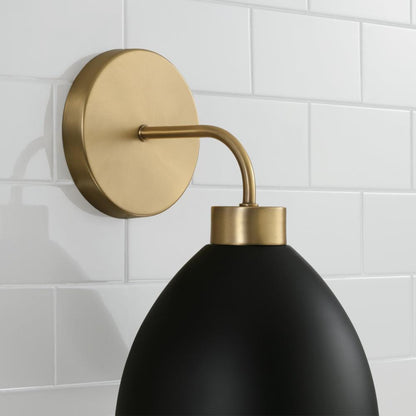 Capital 1-Light Sconce in Aged Brass and Black