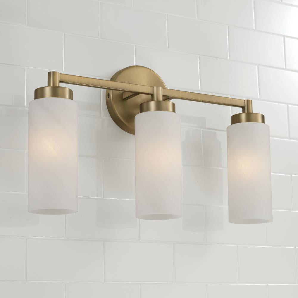 Capital 3-Light Cylindrical Vanity in Aged Brass with Faux Alabaster Glass
