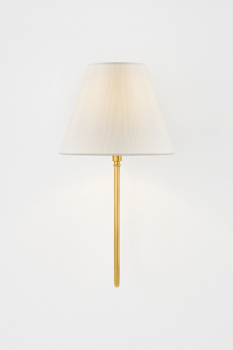 Hudson Valley Hawthorne Wall Sconce in Aged Brass, room setting 1