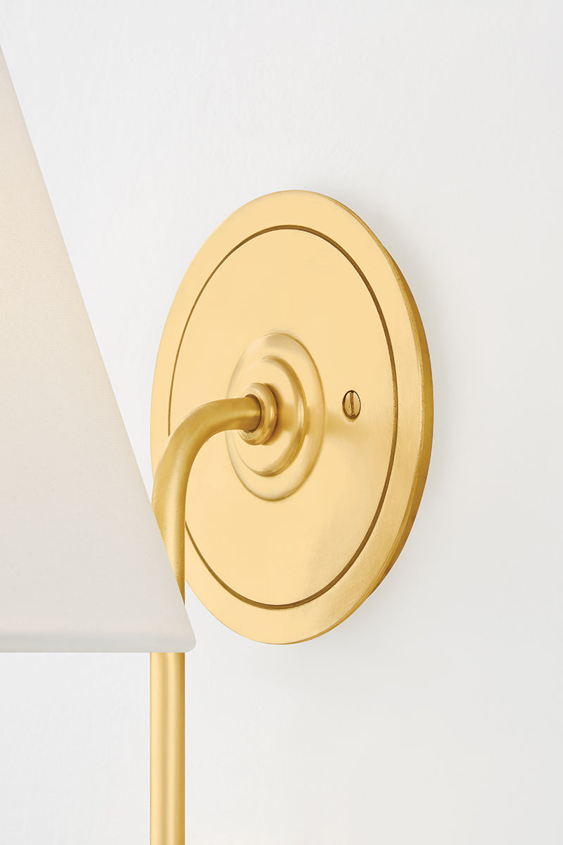 Hudson Valley Hawthorne Wall Sconce in Aged Brass, room setting 3