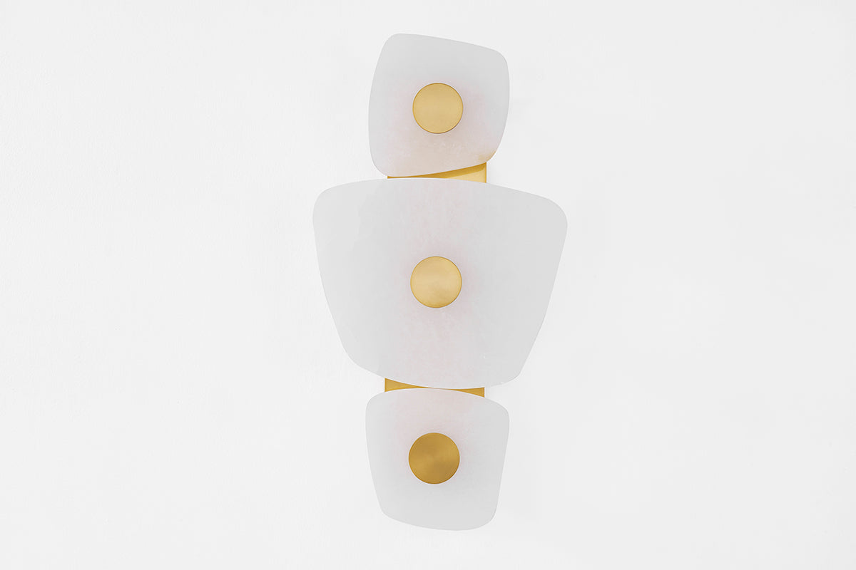 Hudson Valley Holmdel 3-Light Wall Sconce in Aged Brass, room setting 1