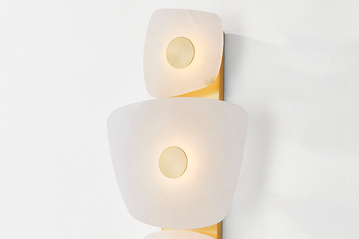 Hudson Valley Holmdel 3-Light Wall Sconce in Aged Brass, room setting 2