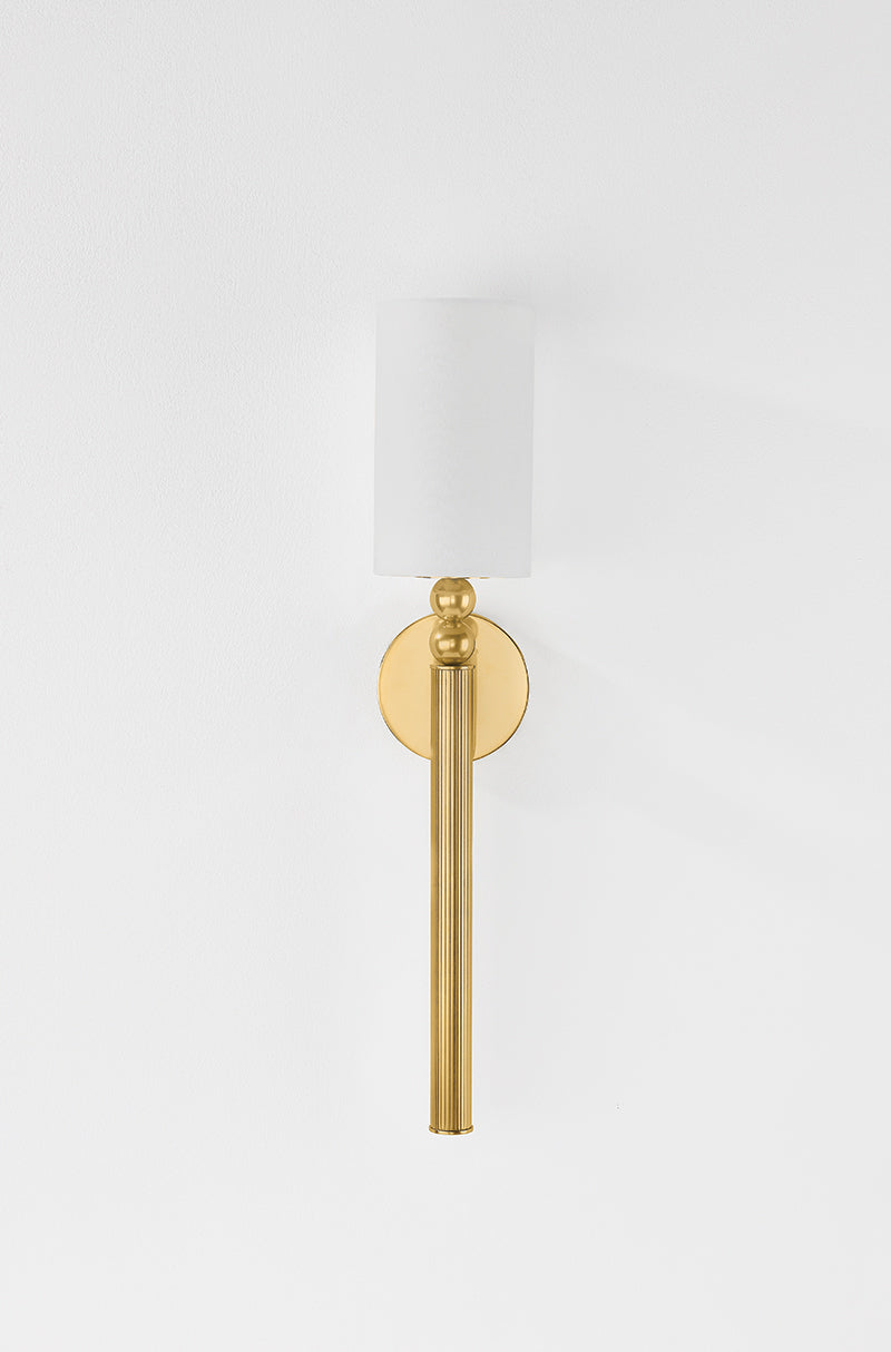 Hudson Valley Lakeport Wall Sconce in Aged Brass, room setting 1