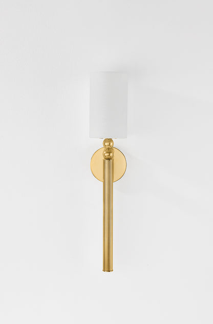 Hudson Valley Lakeport Wall Sconce in Aged Brass, room setting 1