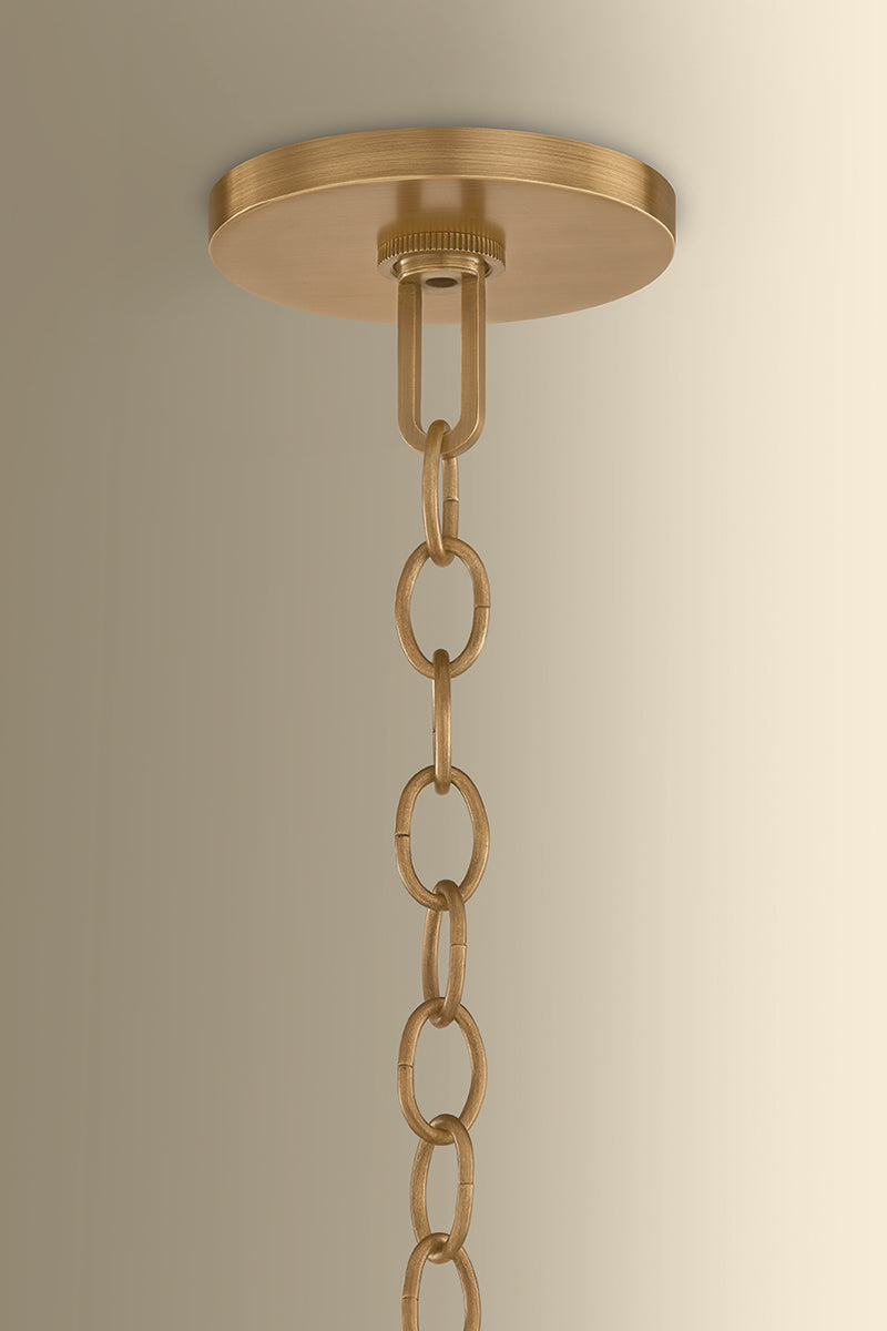 Hudson Valley Omi 9" Pendant in Patina Brass, room setting 1