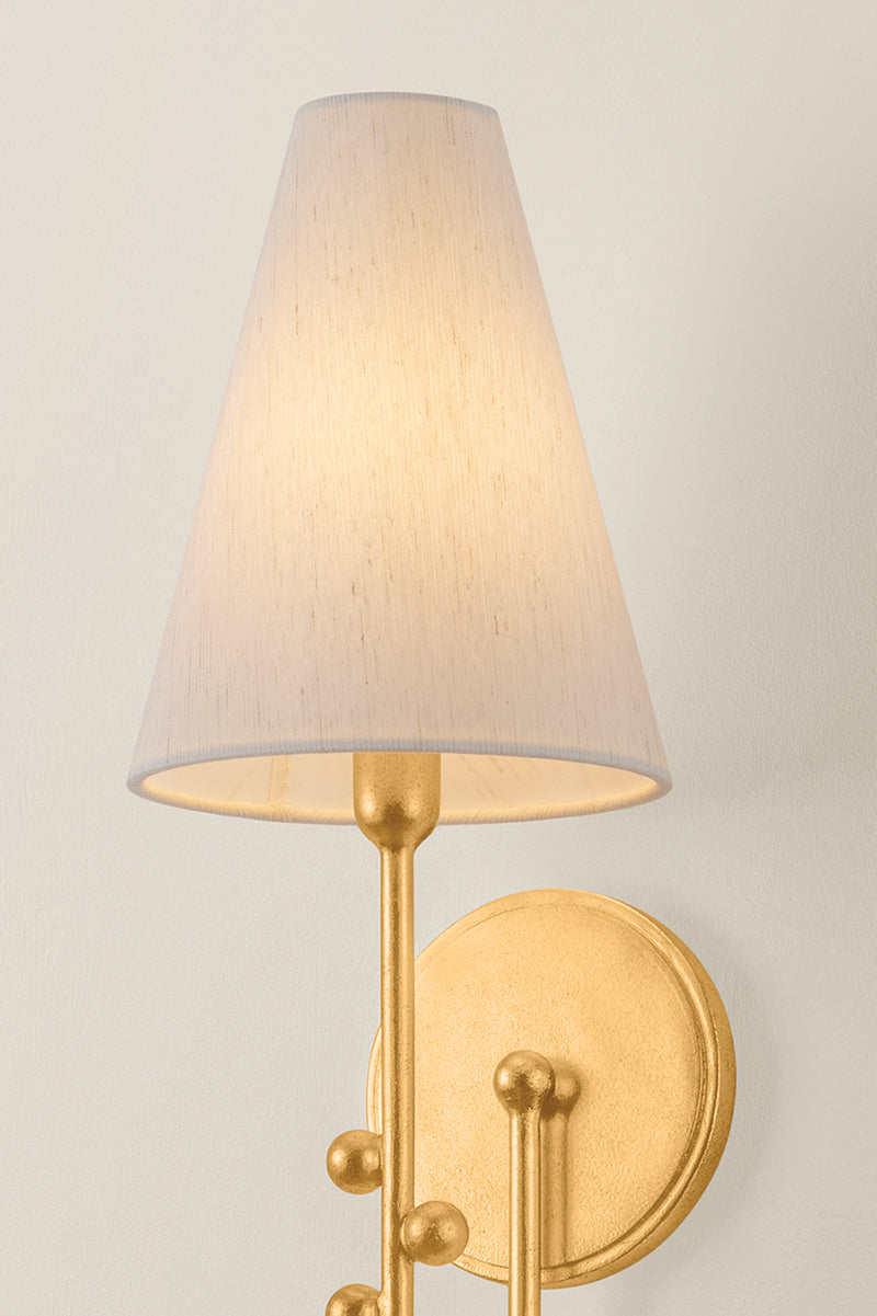 Hudson Valley Pine Hills Wall Sconce in Vintage Gold Leaf, room setting 1