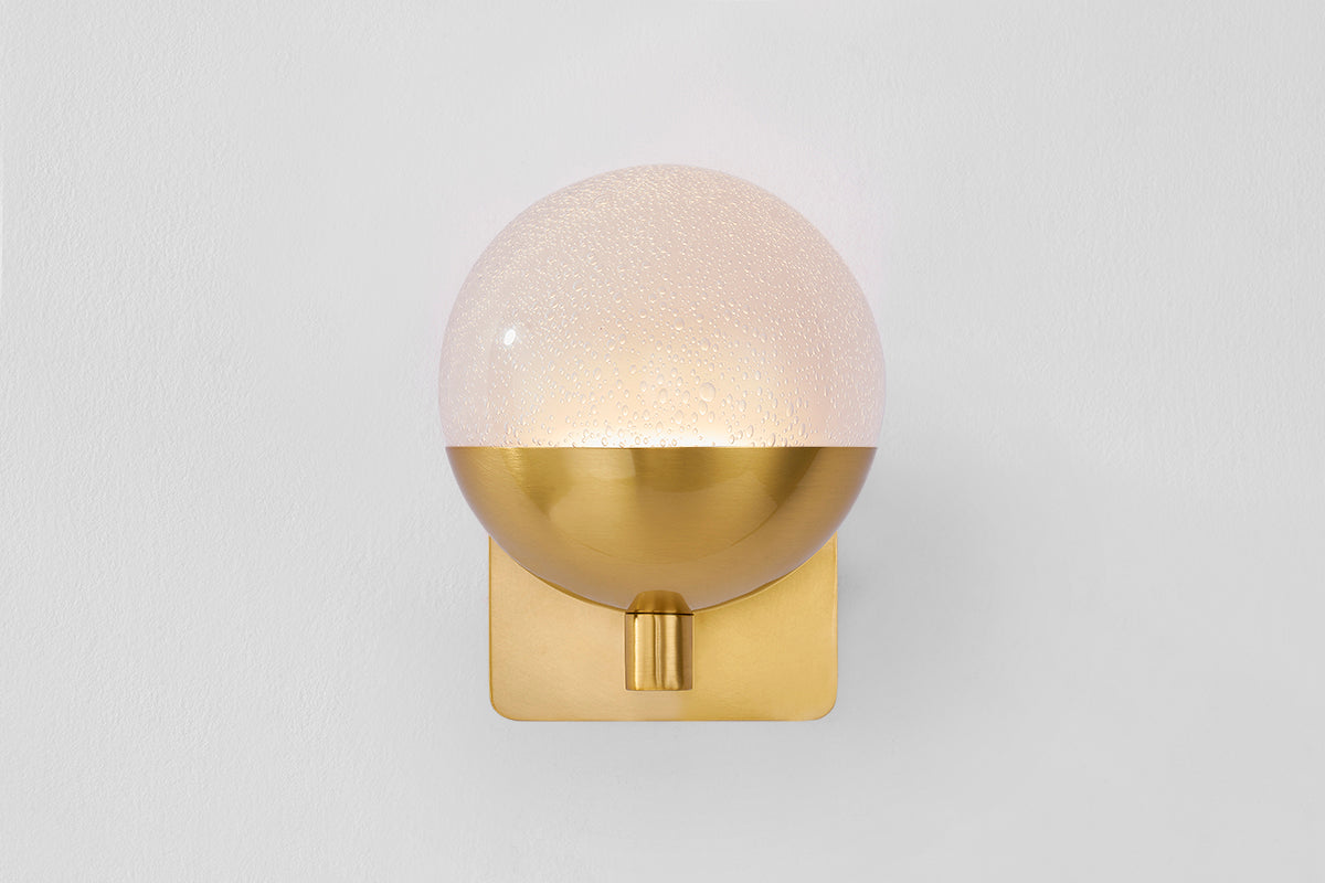 Hudson Valley Rochford Wall Sconce in Aged Brass, room setting 1