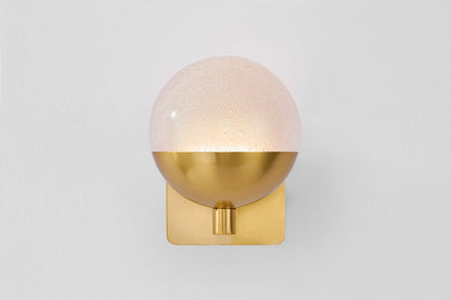 Hudson Valley Rochford Wall Sconce in Aged Brass, room setting 1
