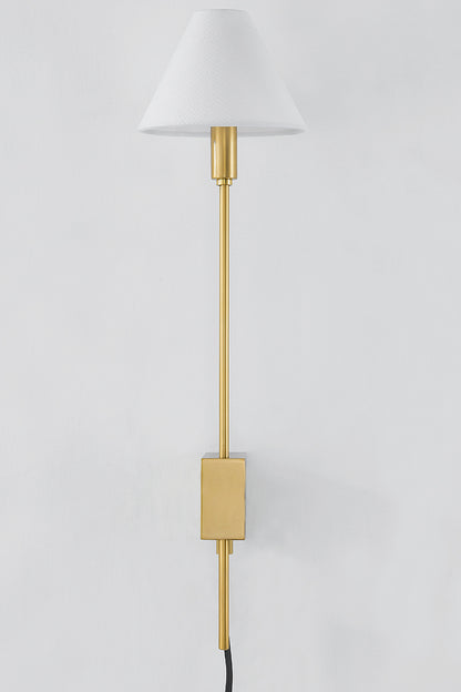 Hudson Valley Teaneck Plug-In Wall Sconce in Aged Brass, room setting 1