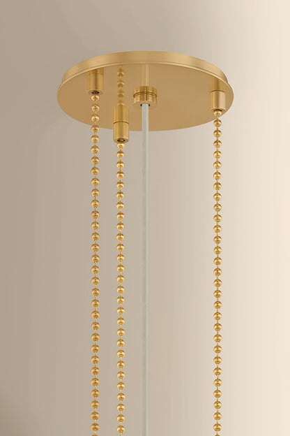Hudson Valley Valeria 3-Light Pendant in Aged Brass, room setting 1