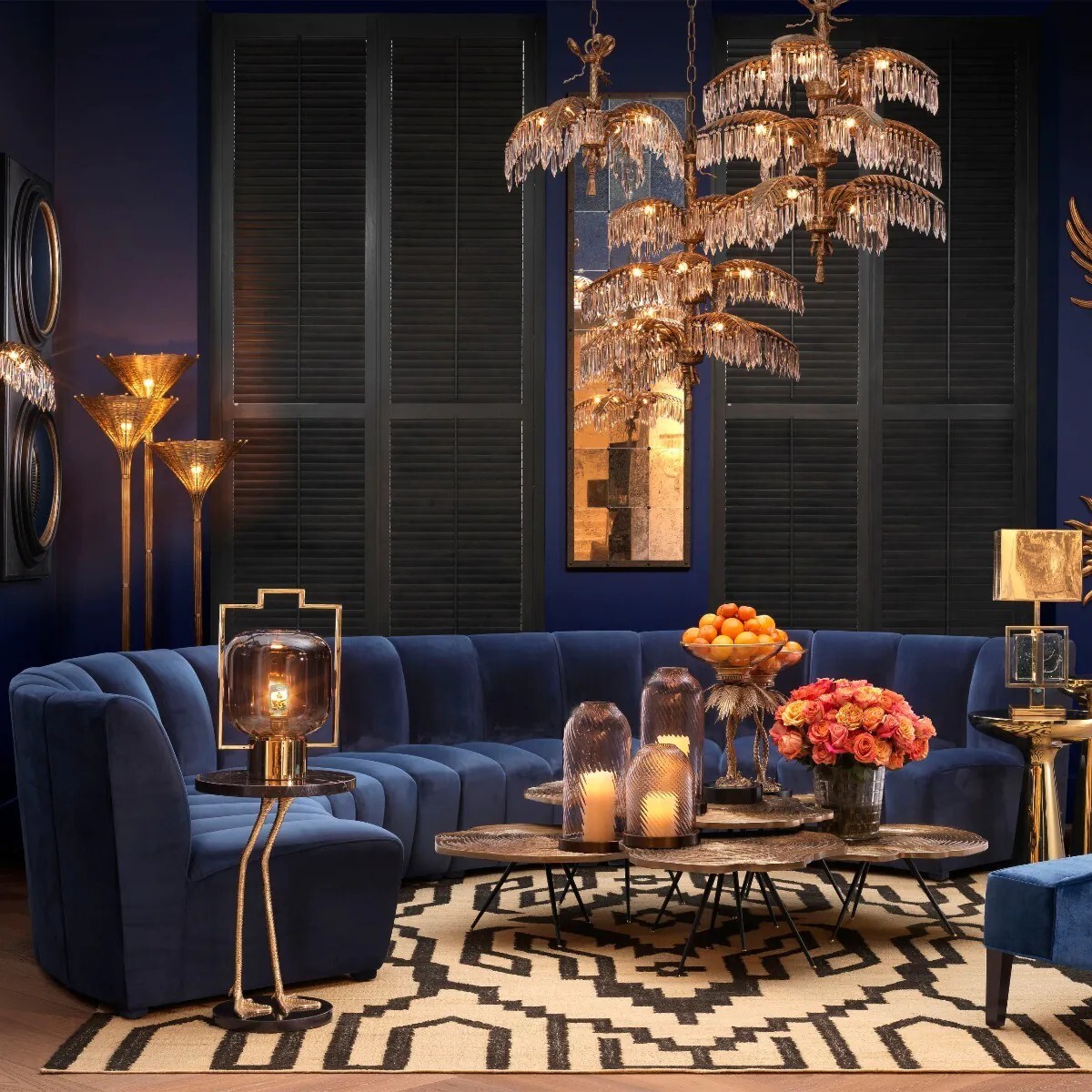 The Lando Sofa Sectional by Eichholtz in Savona Midnight Blue Velvet finish styled in a grand color drenched sitting room.
